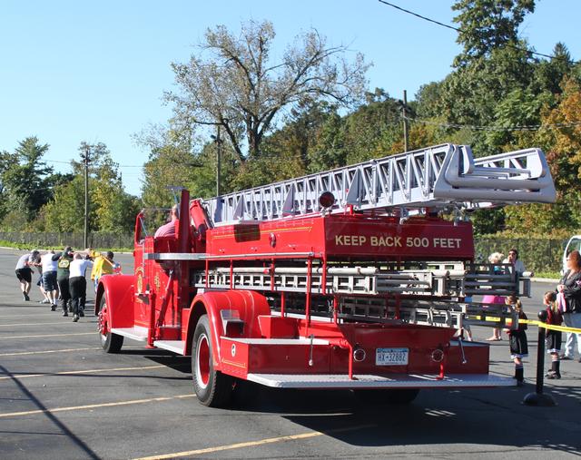 3rd Annual Fire Truck pull for Breast Cancer 9-23-2012. Won by Nanuet  Fire Department in 17.02 seconds,
Photo By Vincent P. Tuzzolino